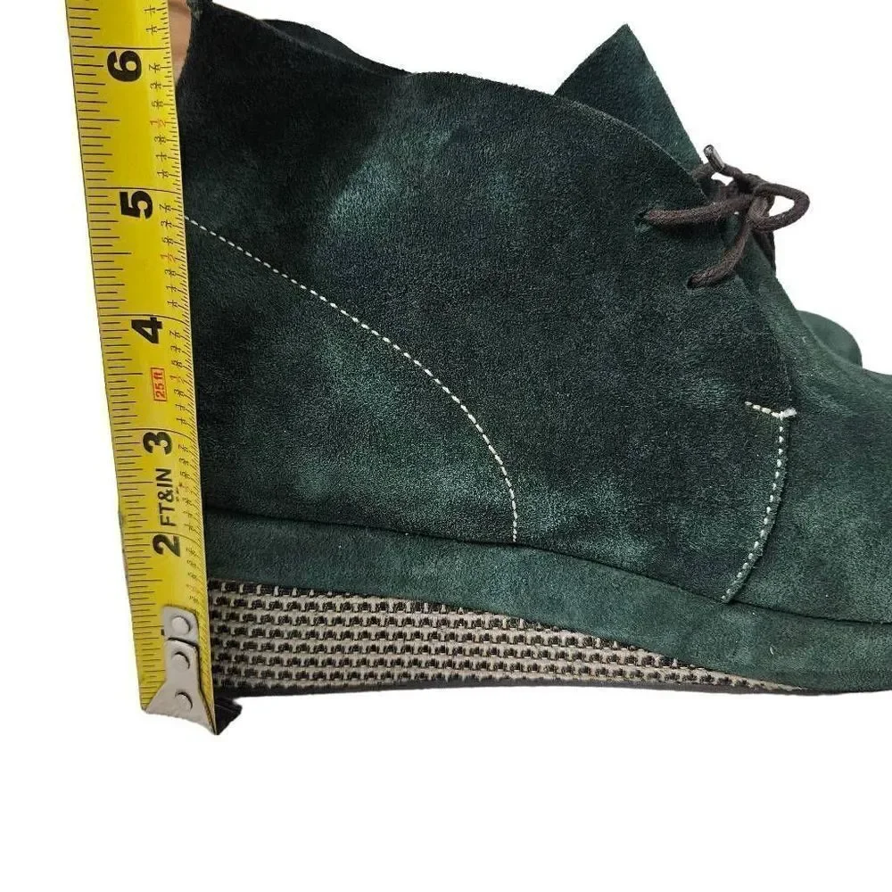 Fausto Santini green boots